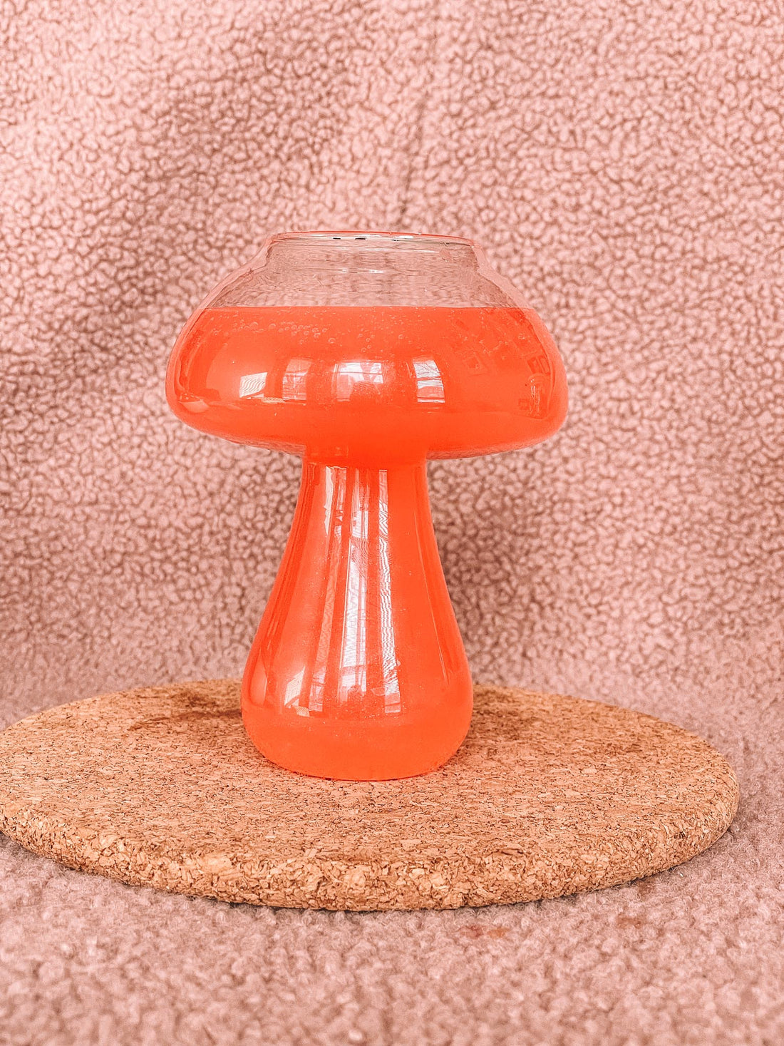 Mushroom shaped cup with red drink