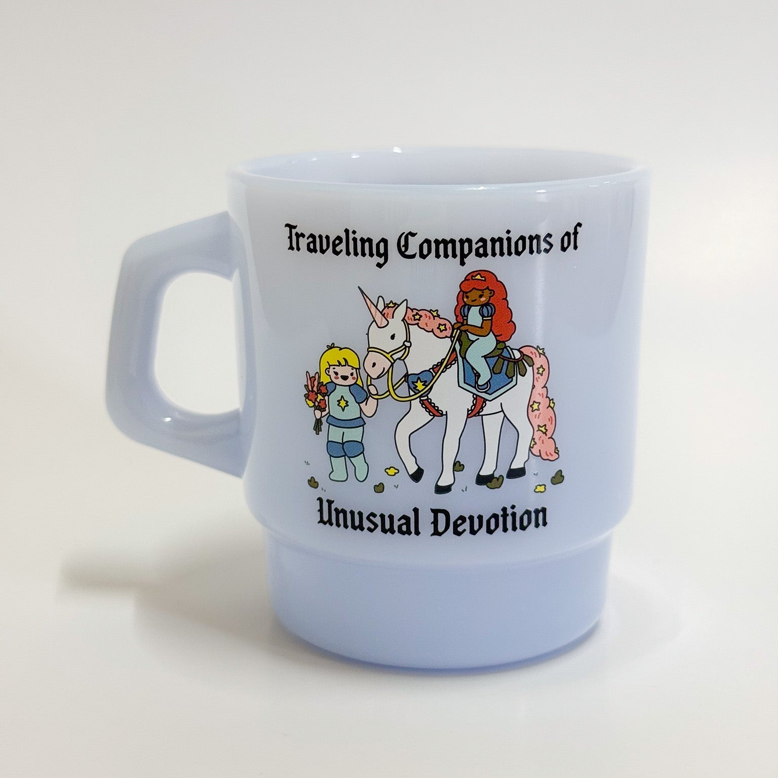 Mug with cartoon characters and text &